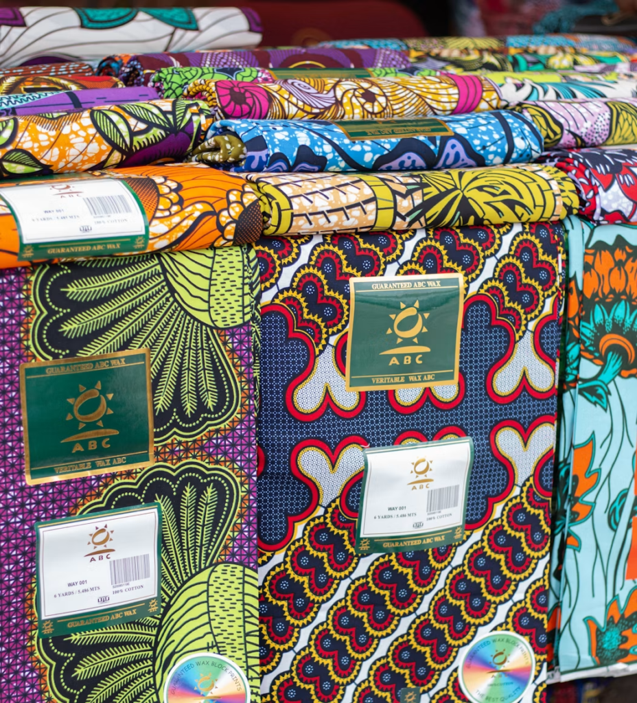 Vibrant Ankara fabric showing the bold wax-print pattern and rich colour — the foundation of African cultural fashion